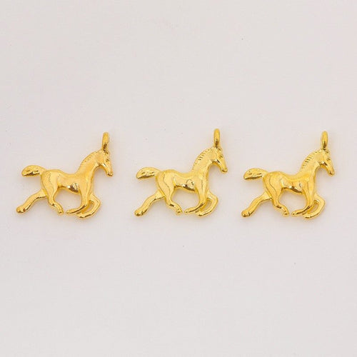 Front and reverse views of the running horse charm