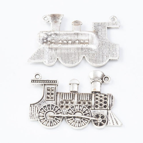 Close view of the steam locomotive front and reverse