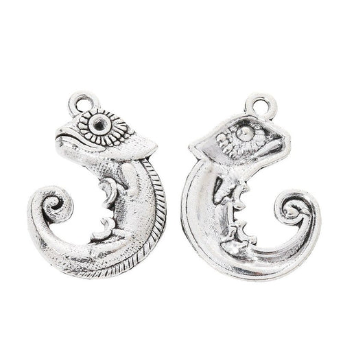 Grouped view of the curled tail gecko metal charm from the front