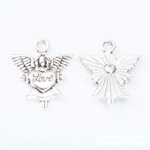 Close view of the angel charm showing its raised front pattern