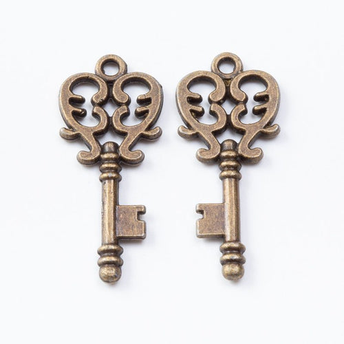 Ornate Key metal piece shown in product image 2