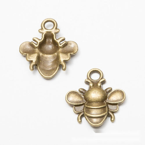 Detailed front and back view of 立体蜜蜂 charm on a white background