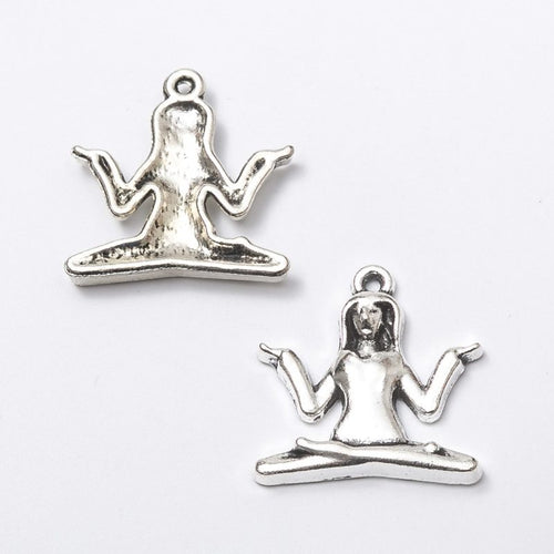 Closer view of the seated yoga woman charm surface and hanging loop