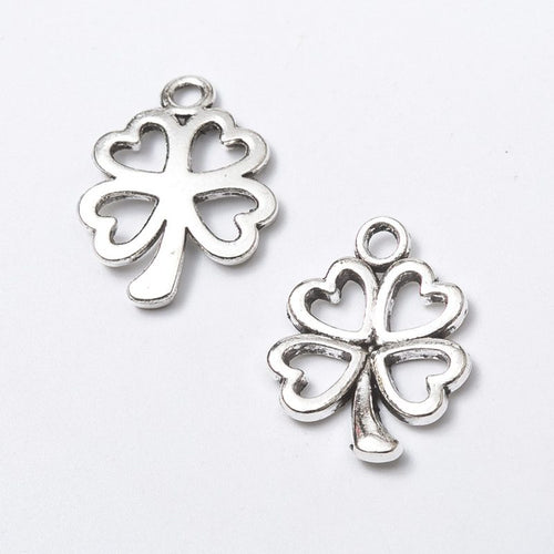 Closer front view of the openwork four leaf clover shape and surface details.