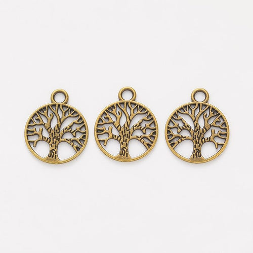 Round Tree of Life Metal Charms close product view showing form and surface detail