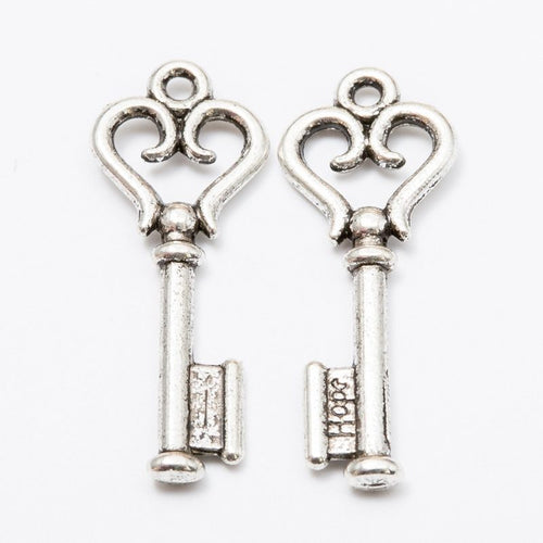 Heart Bow Key Charm alternate product arrangement