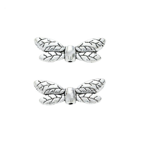 Close front view showing the shape and recessed details of the leaf pattern wing spacer beads
