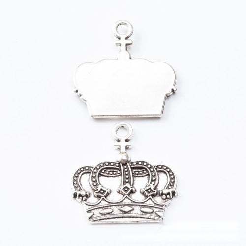 Openwork royal crown charms with rounded arches and a top loop shown from the front on a white background.