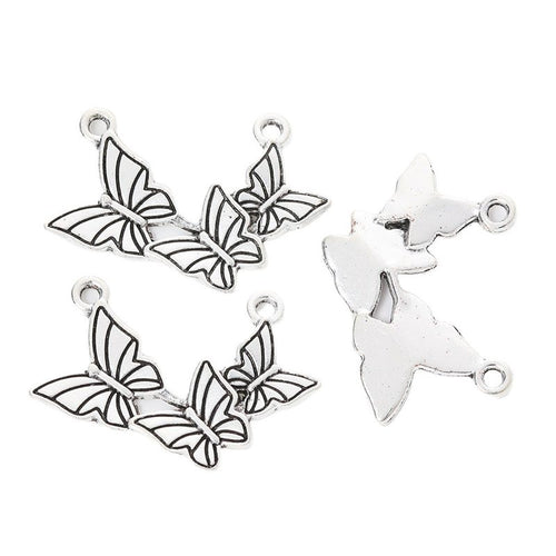 Grouped butterfly branch connector components showing repeated front details and finish