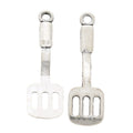 Slotted Spatula Charm In Antique Bronze and Antique Silver Metal Finish view 2