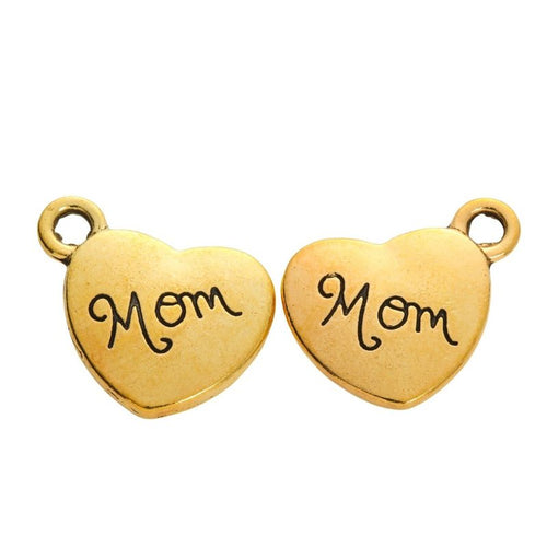 Front detail view of the Mom Engraved Heart metal piece