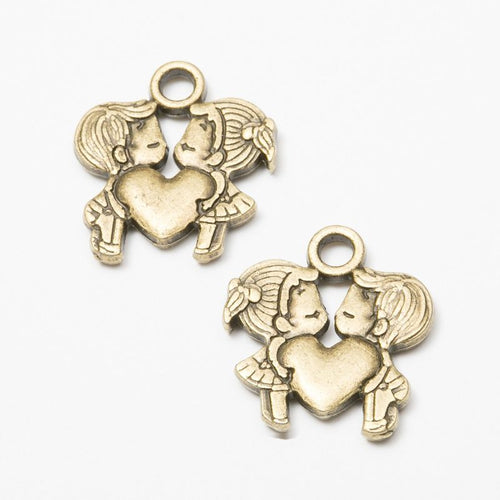 Heart Couple metal piece showing front-facing surface and relief detail