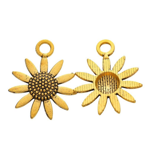 Close front view of sunflower charm showing a beaded center and radiating petals