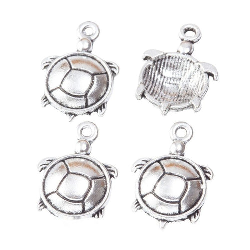 Round turtle connectors with open shell rings and lower hanging loops shown from the front on a white background.