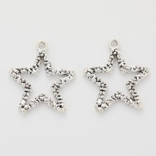 Alternate product view of star and crescent moon charms on a white background