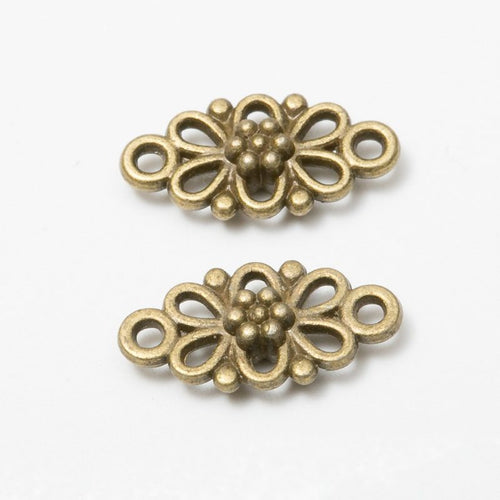 Floral Double Loop Metal Connectors close product view showing form and surface detail