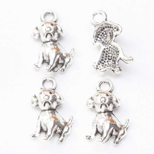 Small sitting puppy metal component, front and reverse detail on white