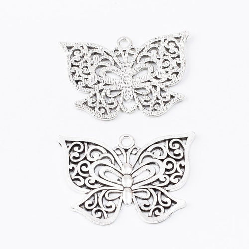 Filigree Butterfly Charm Pendant front detail showing layered wings filled with scrolling openwork