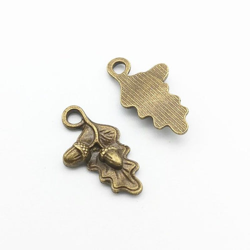 Front detail view of one pictured finish of oak leaf acorn charms