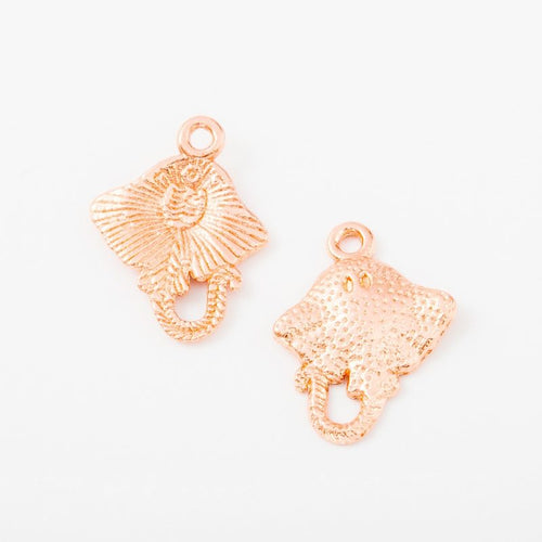 Manta Ray Charm shown from the front in contrasting finishes