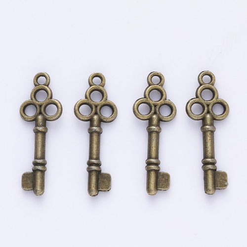 Ornate Key Charm front and reverse details