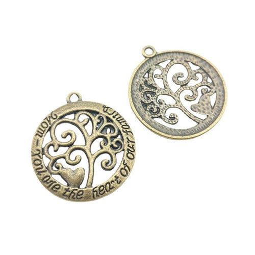 Closer front view of the tree of life medallion shape and surface details.