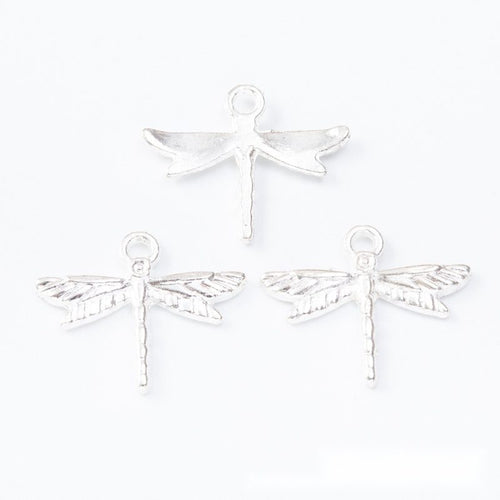 Close-up view of the openwork dragonfly metal charms in four finishes showing its front and reverse metal details.