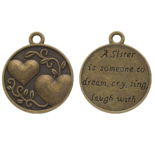 Front detail view of the Sister Heart Disc metal piece