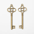 Ornate Skeleton Key Metal Charm in Four Pictured Finishes view 2