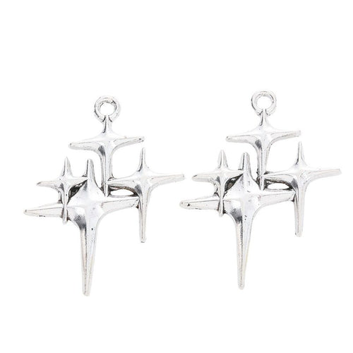 Close view showing the front and reverse details of the four point star charm