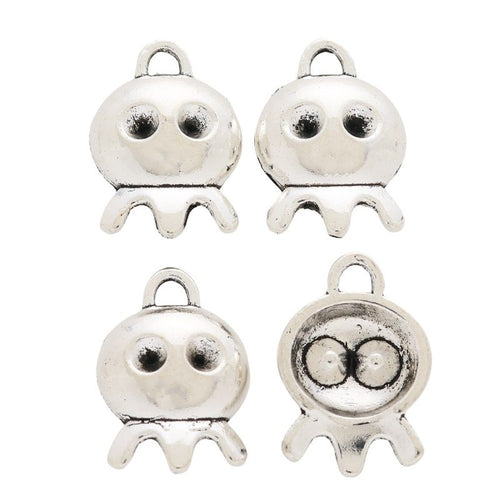 Rounded cartoon octopus connector with two eye holes and a lower loop shown in front detail view