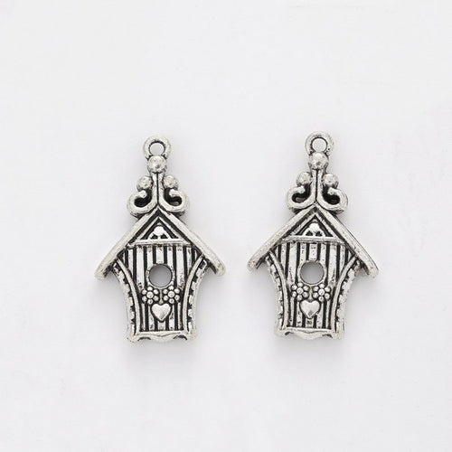 Ornate Birdhouse Charm front and reverse details on a white background