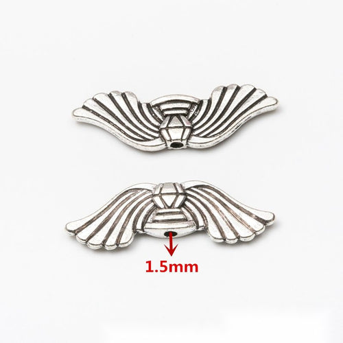 Close view of Angel Wing metal shape and surface detail