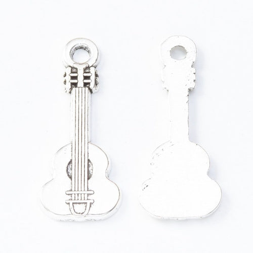 Acoustic Guitar Metal Charms close product view showing form and surface detail