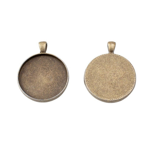 Angled detail views of round bezel pendants