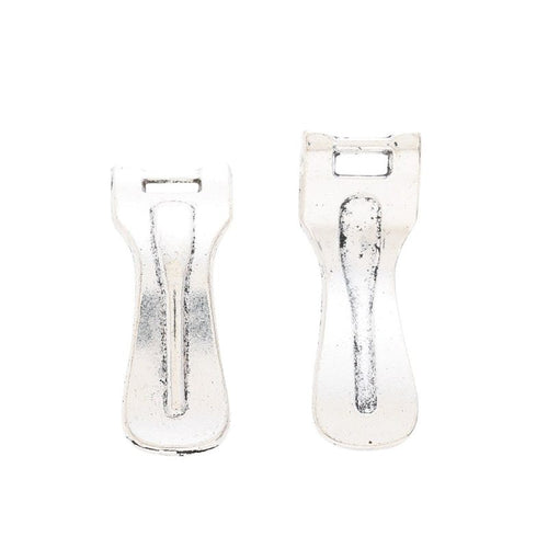 Grouped front and back views showing the details of vegetable peeler charms