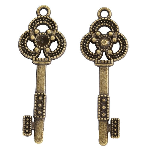 Close view of the flower bow skeleton key showing a rounded flower bow and dotted shaft texture