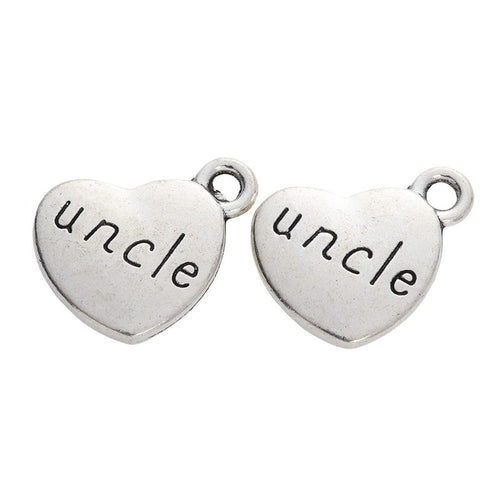 Front detail of uncle engraved heart metal charm
