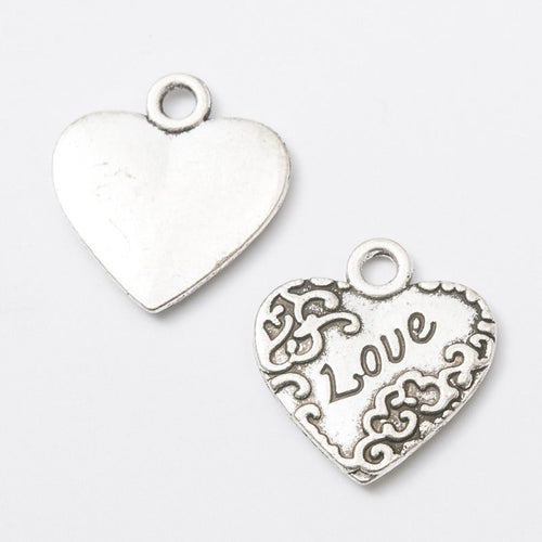 Love Heart metal component, reverse and front details on a white background.