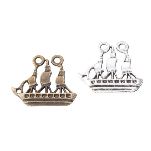 Angled detail views of sailing ship charms