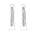 Toothpaste Tube Charm Worded Metal Pendant in Two Finishes view 2