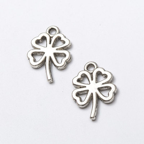 Front and reverse views of the open four leaf clover charm