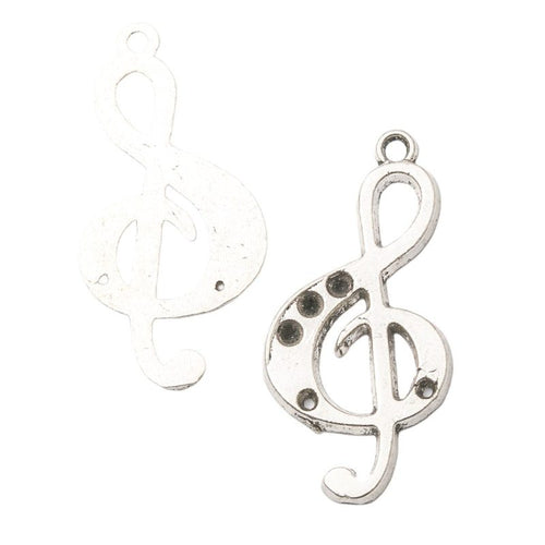 Treble Clef metal component, reverse and front details on a white background.