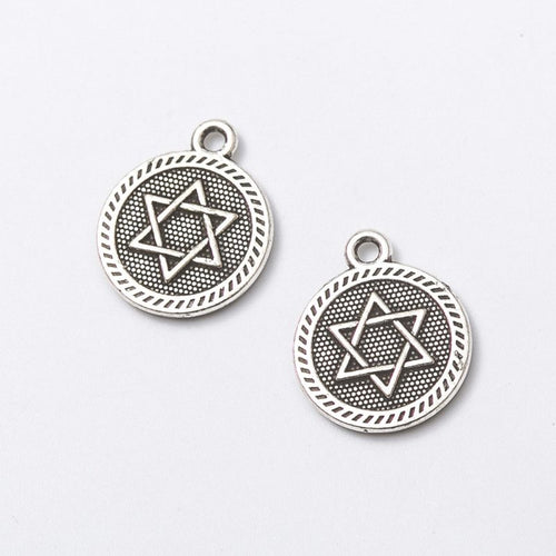Close-up view of the round star hexagram metal charms in two finishes showing its front and reverse metal details.