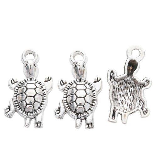 Detail view of textured turtle charm showing finish variation 2