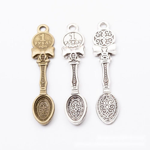 Ornate spoon charms shown in product image 2