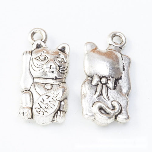 Front and reverse views of the lucky cat in one finish
