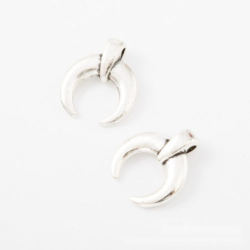 Curved Horn metal design front and back view on a light background