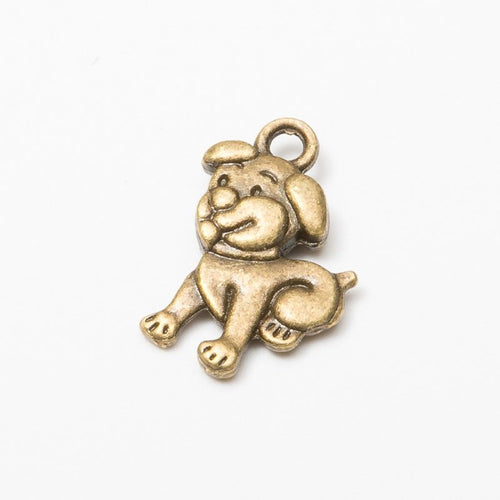 Close product view showing the front and reverse details of the zodiac dog charm