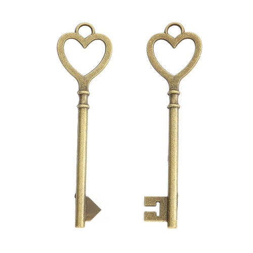 Close view of the long heart bow key showing an open heart bow, slim shaft, and notched bit